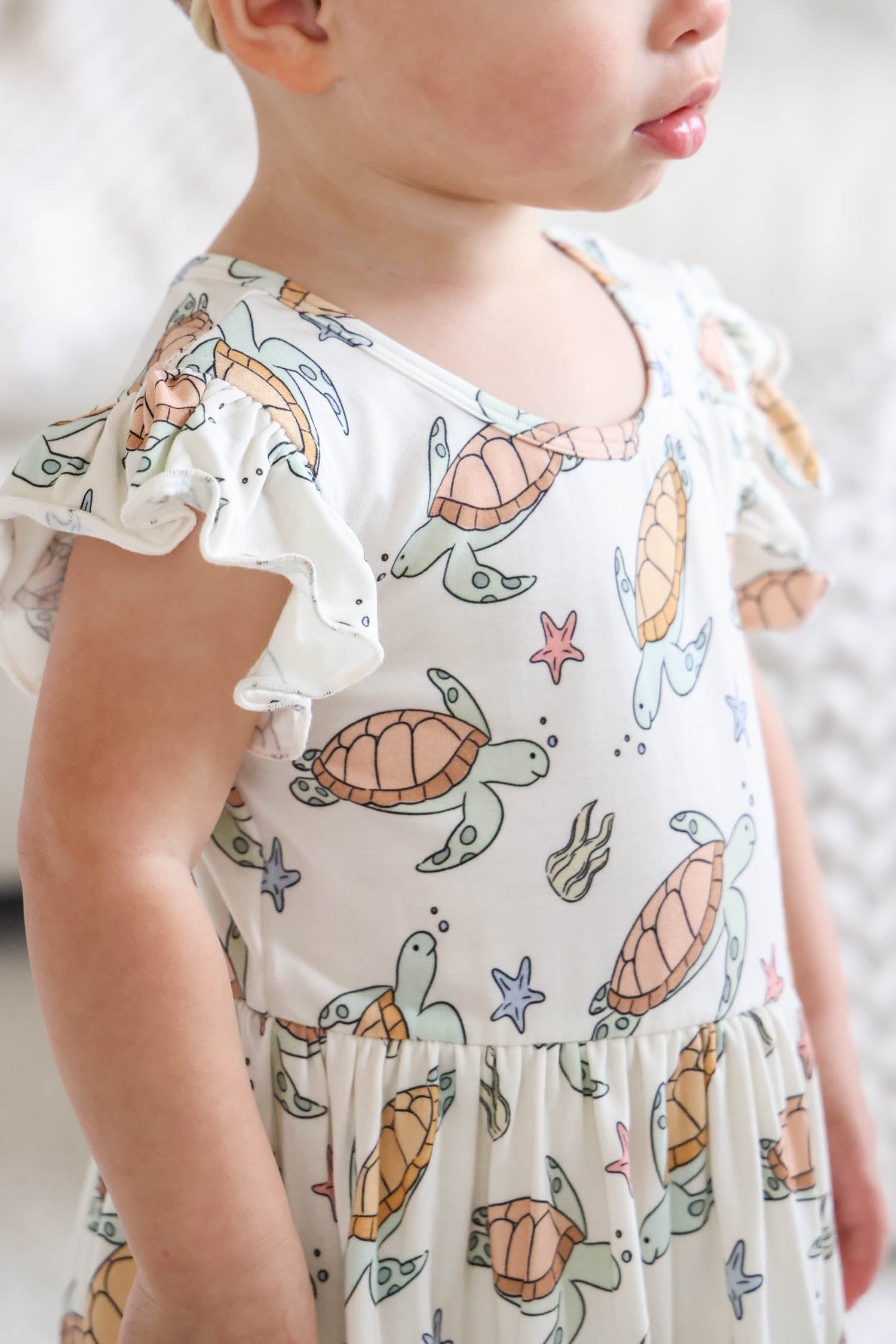 Sleeveless Twirl Bodysuit | Turtley Rad