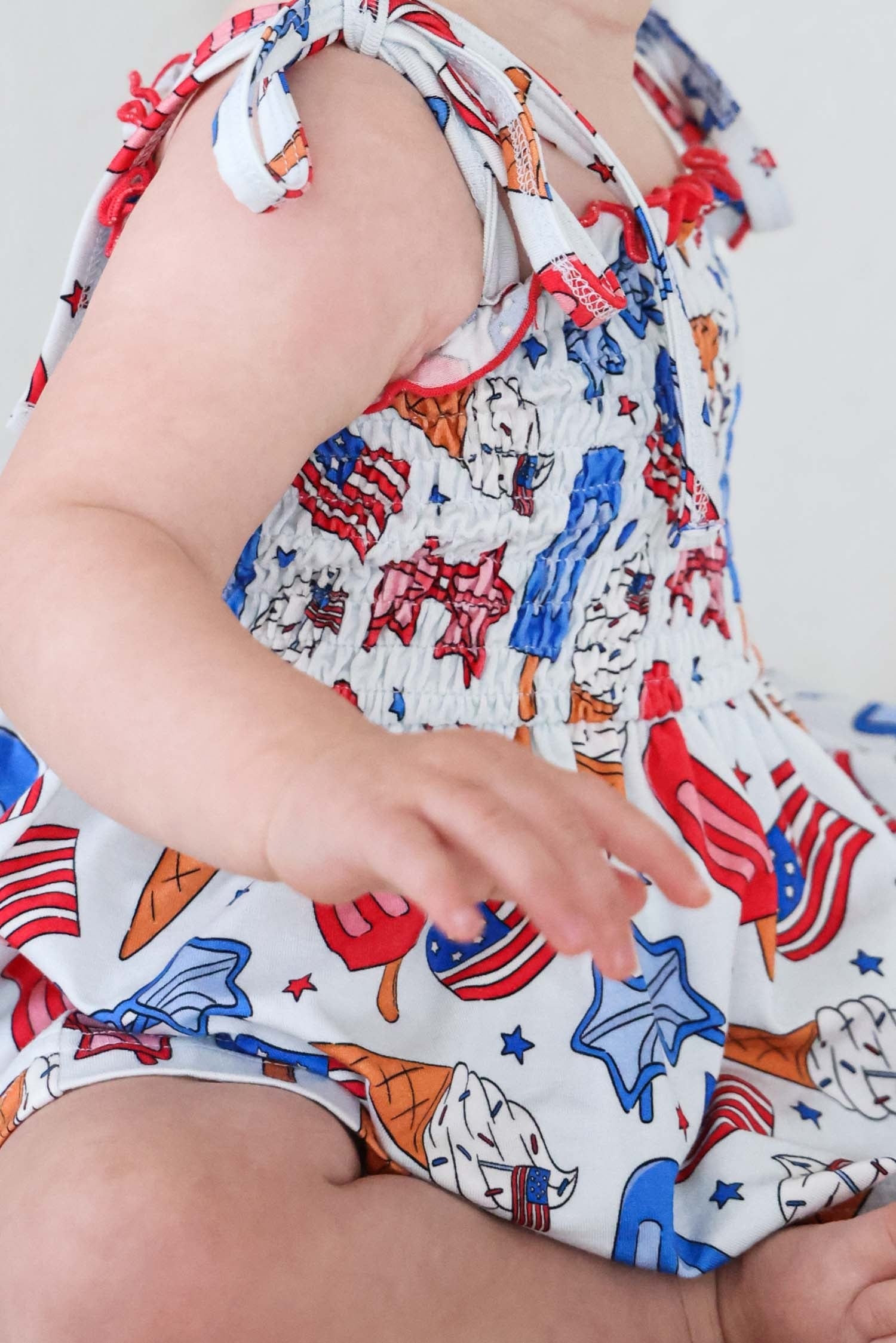 Smocked Twirl Bodysuit | Red, White & Cool