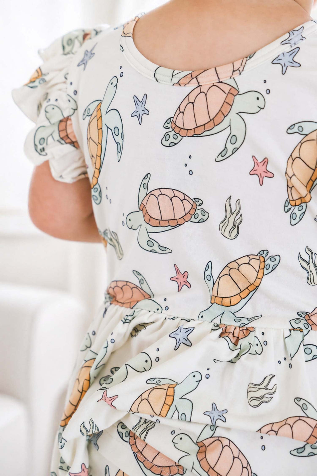 Sleeveless Twirl Bodysuit | Turtley Rad