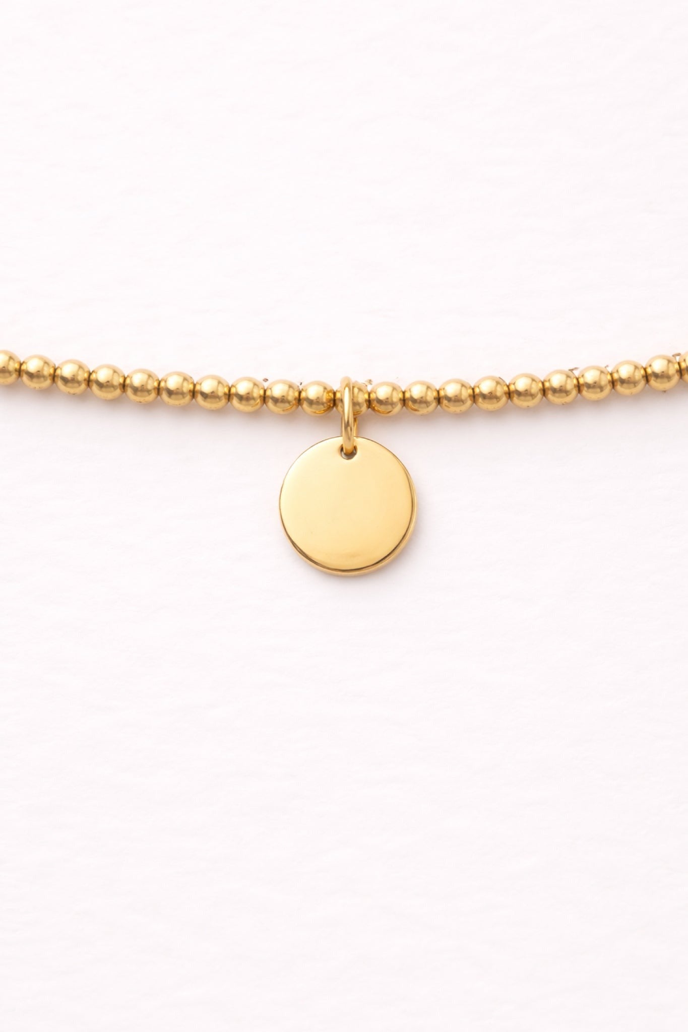 Engraved Circle Charm Beaded Bracelet